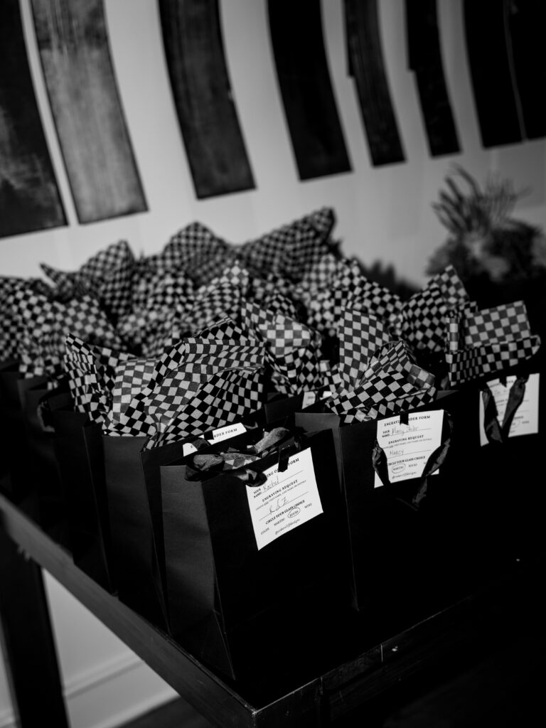 Engraved glassware wedding favors in gift bags for guests to take home at Sanctuary Camelback wedding