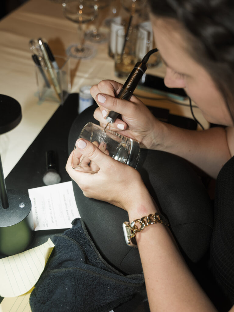 Calligraphy hand engraving on glassware at Scottsdale wedding at Sanctuary Camelback Resort 