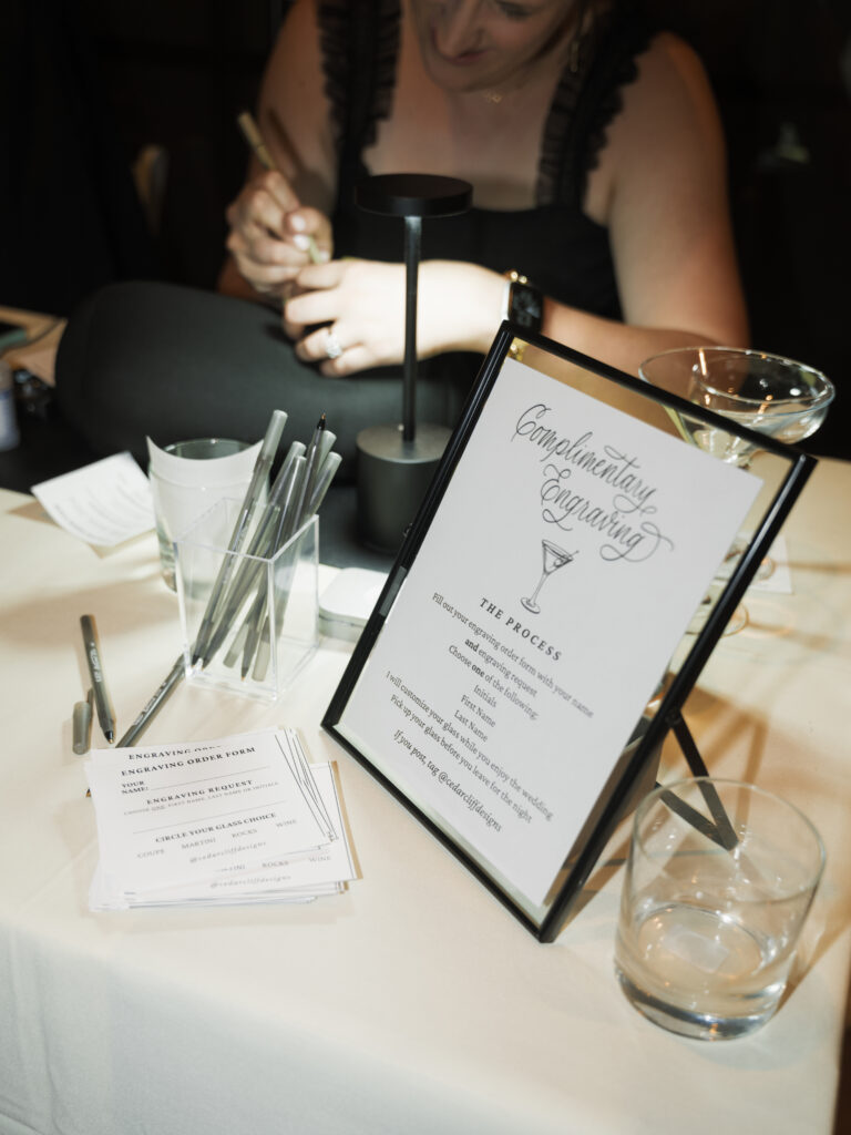 Engraving of favors with calligraphy at Scottsdale wedding at Sanctuary Camelback Resort