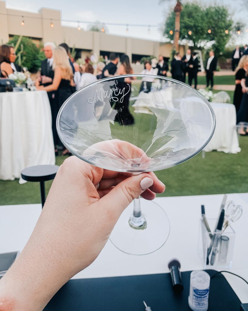 Hand engraved martini glass with the name Marcy engraved on the inside rim for a Scottsdale wedding with custom wedding favors